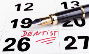 Calendar with dentist written on it